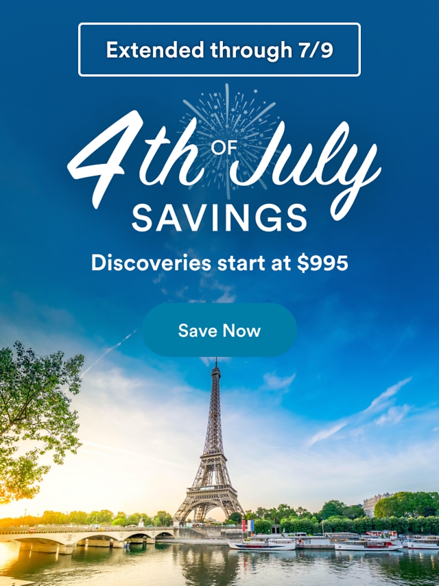 Promotional banner for 4th of July Savings. Discoveries start at $995. The background shows the Eiffel Tower overlooking the Seine River in Paris at sunset with river cruise ships.