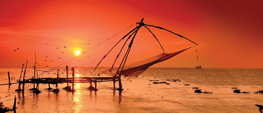 men fishing with triangular scoop net early morning at sunrise